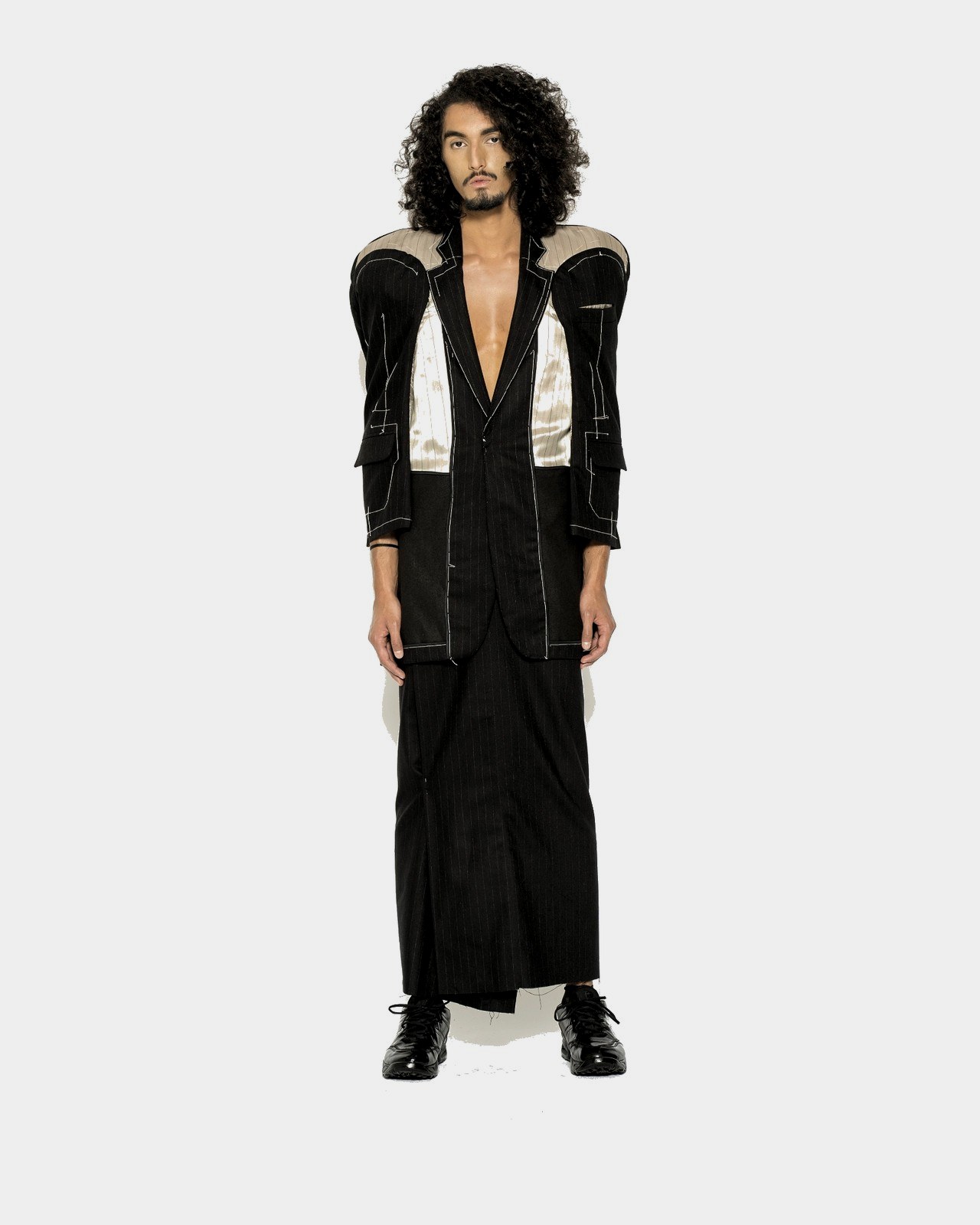 Deconstructed pinstripe tailoring with structured shoulders