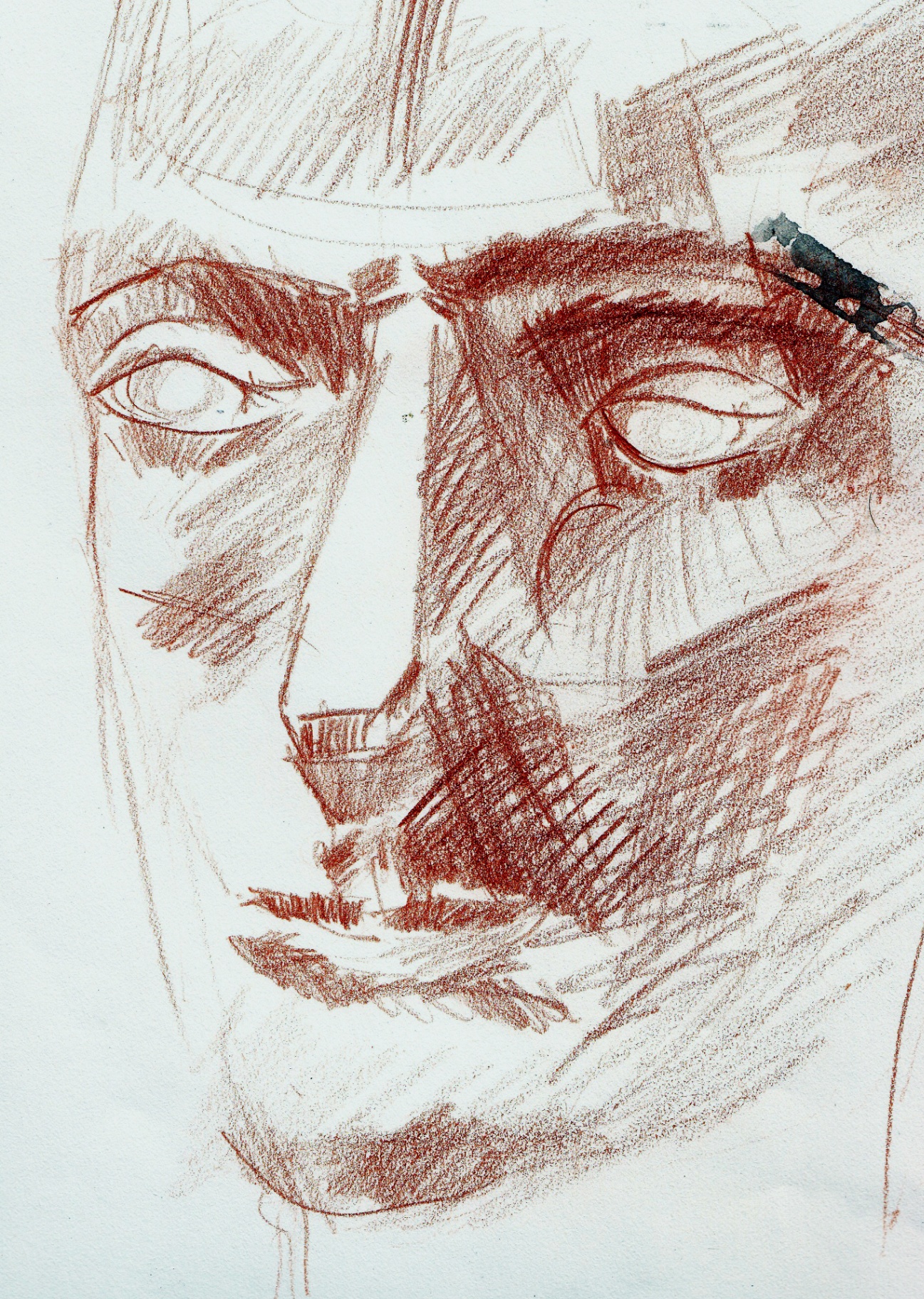 Face Studies - sanguine frontal portrait with double profile in red chalk