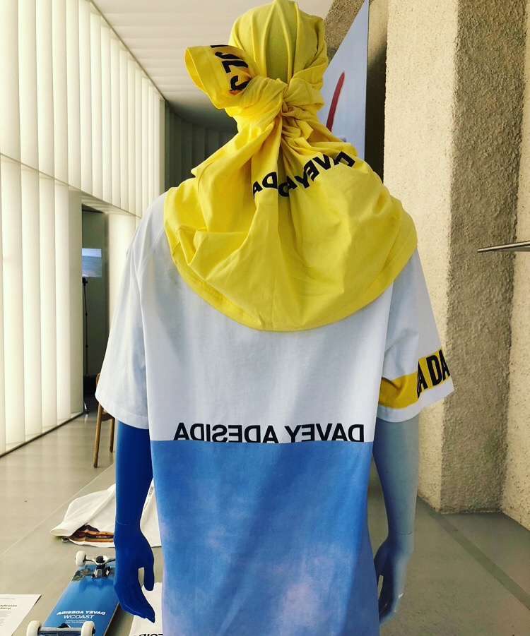 SS19 Davey Adesida print T-shirt with yellow head-wrap, back view on mannequin